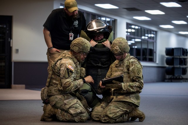 Explosive ordinance disposal technicians (EOD) with 749th Ordnance Company participates in a joint interoperability exercise with TSA transportation security specialist- explosives (TSSE), CSPD bomb squad, and the airport police for the purpose of bomb squad support to the Colorado springs municipal airport, Colorado Springs, Colorado, May 11, 2022. While fostering relationships under Defense Support of Civil Authorities (DSCA), this allowed 749th EOD to run team leader certifications for TL candidates. 