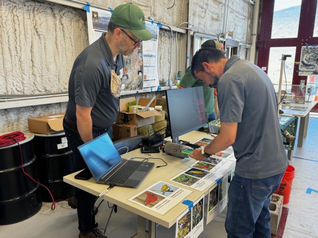 Annually, the U.S. Army Garrison at Pohakuloa Training Area invites the public on-base to have a "look-see" at Army, Air Force and Marine aircraft, enjoy the "Tropic Lightning Band" band performance from the 25th Infantry Division on Schofield Barracks, and learn about all the important management aspects for cultural and natural resource efforts on the premier training base for the military in Hawaii. Today's event brought hundreds of guests from school aged children to kupuna from all parts of the island, along with visitors to the Big Island, who enjoyed the festive day. While it was a little windy, the crowd especially enjoyed PTA first responders, who gave everybody a hands-on demonstration of their airfield crash truck and other fire engines and ambulances. Vendors for the event included: local Hawaii State library, Firewise Wildfire Community Outreach, Rubicon rescue, military recruiters, State DLNR, Hawaii County Police, and the Girl Scouts of America.  Overall, a very fun day in the Saddle Region of the Big Island.  