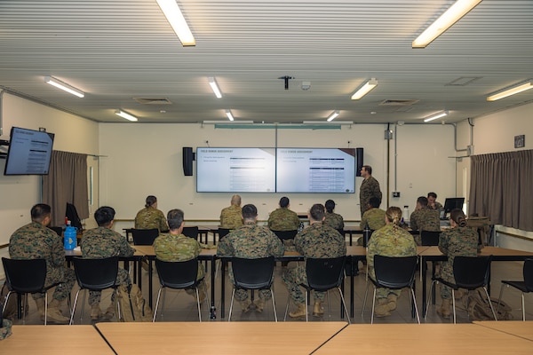 U.S. Navy medical personnel with Marine Rotational Force – Darwin 24.3 and Australian Army soldiers with 1st Health Battalion, 2nd Health Brigade, participate in Valkyrie emergency fresh whole blood transfusion training at Robertson Barracks, Darwin, NT, Australia, May 15, 2024. The Valkyrie program enables military units to self-supply blood through emergency donor panels by adequate training, rehearsal, and preparation, gaining the skills and knowledge to efficiently collect whole blood, and conduct blood transfusions in the event of a casualty. (U.S. Marine Corps photo by Cpl. Juan Torres) (This image was manipulated using masks as a blurring technique)