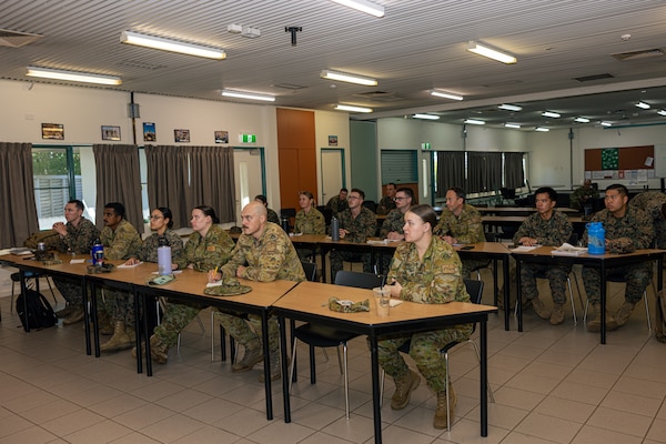 U.S. Navy medical personnel with Marine Rotational Force – Darwin 24.3 and Australian Army soldiers with 1st Health Battalion, 2nd Health Brigade, participate in Valkyrie emergency fresh whole blood transfusion training at Robertson Barracks, Darwin, NT, Australia, May 15, 2024. The Valkyrie program enables military units to self-supply blood through emergency donor panels by adequate training, rehearsal, and preparation, gaining the skills and knowledge to efficiently collect whole blood, and conduct blood transfusions in the event of a casualty. (U.S. Marine Corps photo by Cpl. Juan Torres) (This image was manipulated using masks as a blurring technique)