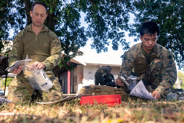Australian Army Sgt. Sean O’Regan, left, a medical technician with 1st Health Battalion, 2nd Health Brigade, and U.S. Navy Seaman Albert Romarate, a hospital corpsman with Combat Logistics Battalion 5 (Reinforced), Marine Rotational Force – Darwin 24.3, organize medical equipment during Valkyrie emergency fresh whole blood transfusion training at Robertson Barracks, Darwin, NT, Australia, May 16, 2024. The Valkyrie program enables military units to self-supply blood through emergency donor panels by adequate training, rehearsal, and preparation, gaining the skills and knowledge to efficiently collect whole blood, and conduct blood transfusions in the event of a casualty. Romarate is a native of California. (U.S. Marine Corps photo by Cpl. Juan Torres)