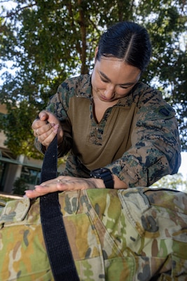 U.S. Navy Petty Officer 3rd Class Ariana Buckley, a hospital corpsman with Combat Logistics Battalion 5 (Reinforced), Marine Rotational Force – Darwin 24.3, applies a tourniquet during Valkyrie emergency fresh whole blood transfusion training at Robertson Barracks, Darwin, NT, Australia, May 16, 2024. The Valkyrie program enables military units to self-supply blood through emergency donor panels by adequate training, rehearsal, and preparation, gaining the skills and knowledge to efficiently collect whole blood, and conduct blood transfusions in the event of a casualty. Buckley is a native of New York. (U.S. Marine Corps photo by Cpl. Juan Torres)