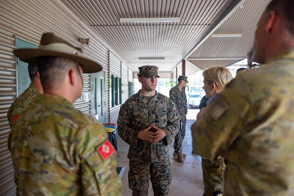 U.S. Navy Petty Officer 1st Class Kyle Hamlin, center, a hospital corpsman with 2nd Battalion, 5th Marine Regiment (Reinforced), Marine Rotational Force – Darwin 24.3, speaks with Australian Army soldiers during Valkyrie emergency fresh whole blood transfusion training at Robertson Barracks, Darwin, NT, Australia, May 17, 2024. The Valkyrie program enables military units to self-supply blood through emergency donor panels by adequate training, rehearsal, and preparation, gaining the skills and knowledge to efficiently collect whole blood, and conduct blood transfusions in the event of a casualty. Hamlin is a native of Florida. (U.S. Marine Corps photo by Cpl. Juan Torres)