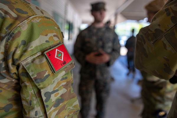 U.S. Navy Petty Officer 1st Class Kyle Hamlin, a hospital corpsman with 2nd Battalion, 5th Marine Regiment (Reinforced), Marine Rotational Force – Darwin 24.3, speaks with Australian Army soldiers during Valkyrie emergency fresh whole blood transfusion training at Robertson Barracks, Darwin, NT, Australia, May 17, 2024. The Valkyrie program enables military units to self-supply blood through emergency donor panels by adequate training, rehearsal, and preparation, gaining the skills and knowledge to efficiently collect whole blood, and conduct blood transfusions in the event of a casualty. Hamlin is a native of Florida. (U.S. Marine Corps photo by Cpl. Juan Torres)
