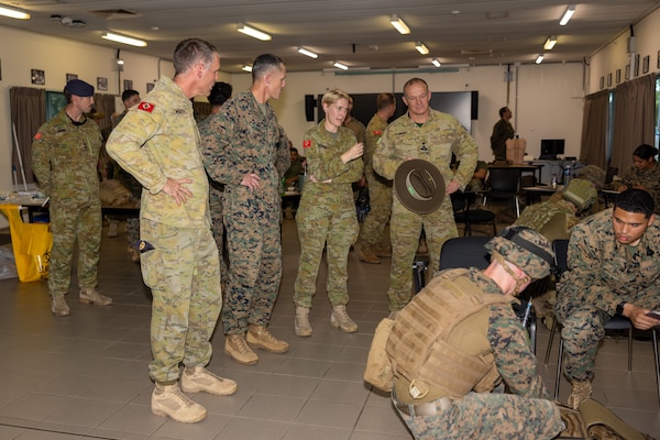 U.S. Marine Corps Lt. Col. Clinton K. Hall, center left, the battalion commander of 2nd Battalion, 5th Marine Regiment (Reinforced), Marine Rotational Force – Darwin 24.3, speaks with Australian Army soldiers during Valkyrie emergency fresh whole blood transfusion training at Robertson Barracks, Darwin, NT, Australia, May 17, 2024. The Valkyrie program enables military units to self-supply blood through emergency donor panels by adequate training, rehearsal, and preparation, gaining the skills and knowledge to efficiently collect whole blood, and conduct blood transfusions in the event of a casualty. Hall is a native of Nevada. (U.S. Marine Corps photo by Cpl. Juan Torres)