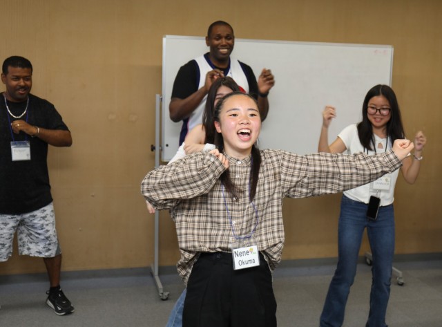 Nene Okuma, center, teaches a dance to Camp Zama volunteers during a language and cultural event at Zama City Hall, Japan, May 3, 2024. The volunteers helped a group of students get ready for an exchange trip this summer to Zama City’s sister city in Tennessee.