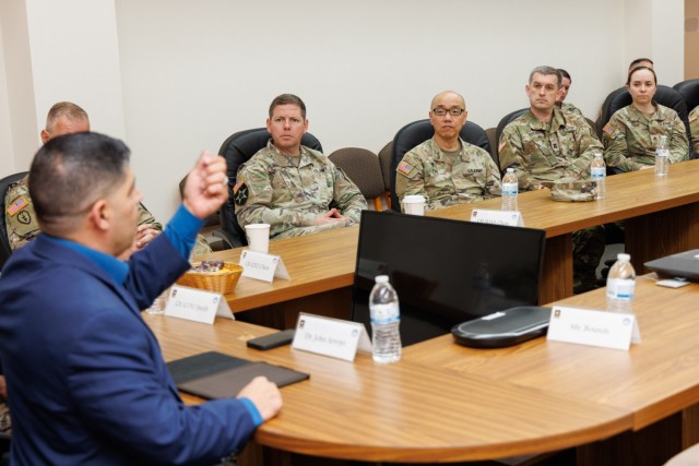 John Arroyo, left, a former Special Forces Soldier who was wounded in a mass shooting, speaks to enablers and caregivers during a resiliency workshop inside the U.S. Army Japan headquarters building at Camp Zama, May 9, 2024.