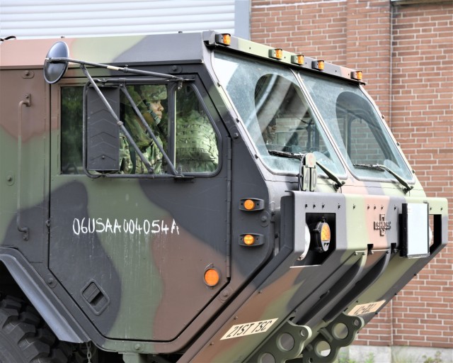 U.S. Soldiers inside a military vehicle.