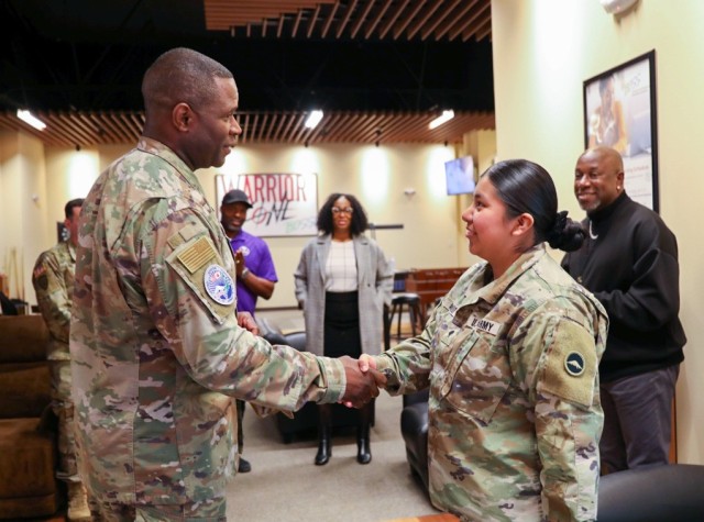 Air Force Chief Master Sgt. Leon Calloway, left, senior enlisted adviser for U.S. Forces Japan, meets with Soldiers during a visit to Camp Zama, Japan, March 14, 2024. Calloway also recently toured Yokohama North Dock as part of his ongoing site visits to better understand joint missions in the country.