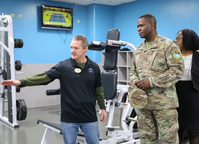 Air Force Chief Master Sgt. Leon Calloway, right, senior enlisted adviser for U.S. Forces Japan, visits a fitness center while touring Camp Zama and Sagami General Depot in Japan on March 14, 2024. Calloway also recently toured Yokohama North Dock as part of his ongoing site visits to better understand joint missions in the country.