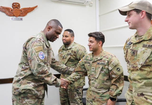 Air Force Chief Master Sgt. Leon Calloway, left, senior enlisted adviser for U.S. Forces Japan, meets with Soldiers during a visit to Camp Zama, Japan, March 14, 2024. Calloway also recently toured Yokohama North Dock as part of his ongoing site visits to better understand joint missions in the country.