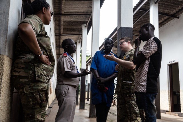 U.S. Army Staff Sgt. Erin Bothwell (left), a preventative medicine specialist (68S) and Capt. Jess Inskeep, an entomologist (72B), both assigned to 172nd Medical Detachment, receive a tour of the Kamenge Military Hospital laboratories with their Burundian counterpart, Lt. Col. Jean Claude Seberege, deputy director of labs, with the Burundi National Defence Force. Bothwell and Inskeep are taking samples and testing the water and other equipment used at the hospital to ensure safety measures are met while assisting the hospital staff in achieving their goals of safely treating patients during the Medical Readiness Exercise (MEDREX) in Bujumbura Burundi, on April 12, 2024.  MEDREX is a medical readiness exercise program, planned and executed by the U.S. Army Southern European Task Force, Africa (SETAF-AF), that allows military health professionals from the U.S. and their African partners to exchange medical practices, procedures and techniques that build and strengthen treatment capabilities, resulting in lasting relationships between the partners. (U.S. Army photo by Sgt. Anthony Hopper)