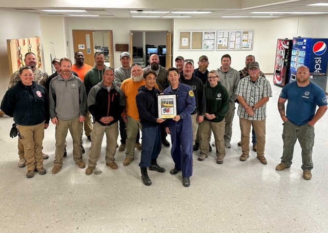 Capt. Takanori Saito, a fire crew chief, and Assistant Chief Masahiro Watanabe, who both work for U.S. Army Garrison Japan, pose for a photo with instructors of an urban search and rescue course at Fort Leonard Wood, Mo. Both firefighters became the first international students to graduate the six-week course in late April 2024.