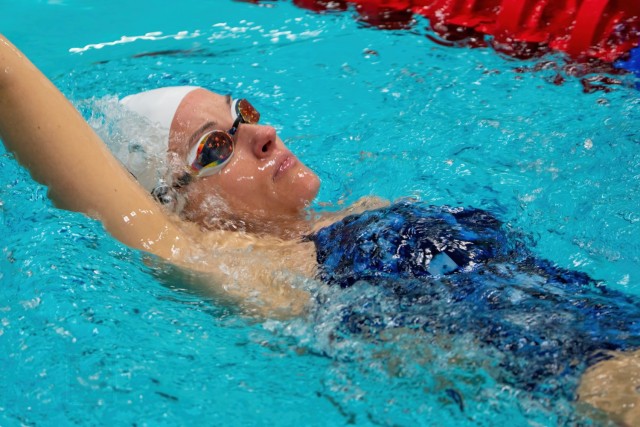 Sgt. 1st Class Elizabeth Marks, a five-time Paralympic Medalist and multiple World Record holder, prepares for the 2022 Para Swimming Nationals, Charlotte, North Carolina, December 16-18, 2022. Marks, an active-duty combat medic, is assigned to the World Class Athlete Program at Fort Carson, Colorado. (U.S. Army Photo by Staff Sgt. Michael Hunnisett)