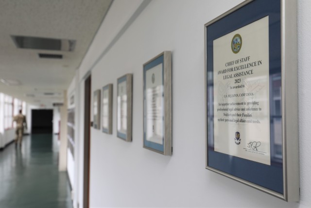 The certificate for the 2023 Army Chief of Staff Award for Excellence in Legal Assistance is displayed outside the Camp Zama Legal Assistance Office located in the U.S. Army Japan headquarters building at Camp Zama, Japan, May 20, 2024. The office recently earned the award for its support to the community.