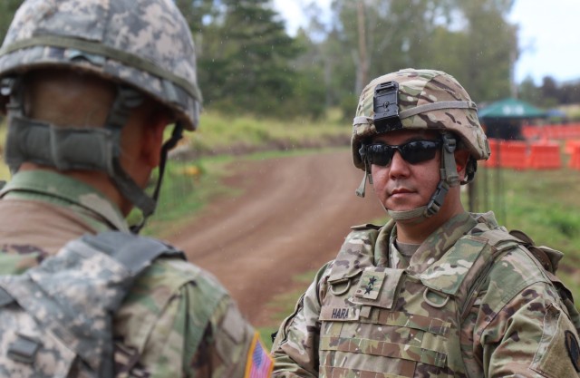 Maj. Gen. Kenneth S. Hara, The Adjutant General of the State of Hawaii, speaks to a 103rd Troop Command Soldier during Individual Weapon Qualification, Schofield Barracks, Hawaii, June 5, 2021. 