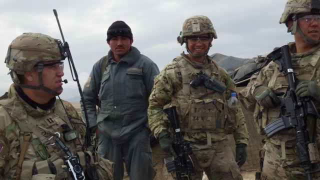Kenneth S. Hara at a police check point in Shah Joy, Afghanistan Afghan  Jan. 13, 2013.
