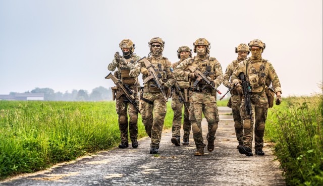 Belgian Special Forces patrol the airfield at Chièvres Air Base.