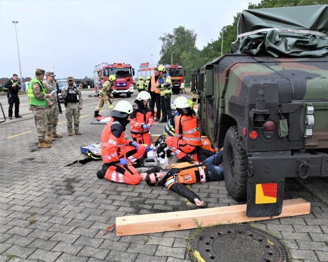 U.S. Army Garrison Benelux personnel and German emergency responders react to an accident scenario