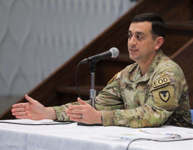 Command Sgt. Maj. David A. Rio, senior enlisted leader of U.S. Army Garrison Japan, answers a question during a workforce town hall at Camp Zama, Japan, May 24, 2024. Col. Marcus Hunter, garrison commander, and Jenifer L. Peterson, deputy garrison commander, also participated in the meeting at Kizuna Hall.