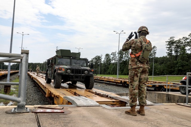 During the past week more than 5,000 Soldiers have arrived at the Joint Readiness Training Center (JRTC) on Fort Johnson, Louisiana to take part in a month-long training exercise led by the 32nd Infantry Brigade Combat Team. As they arrive the Soldiers in-process, gather gear, help offload vehicles from trains and semis, perform maintenance checks, and install MILES (multiple integrated laser engagement system) on everything from personal weapons to all varieties of vehicles, all while acclimating to the Louisiana heat and humidity.