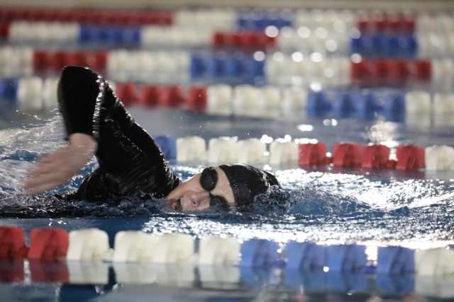 Jenifer L. Peterson, deputy commander of U.S. Army Garrison Japan, competes in a team swim relay event at Yano Fitness Center as part of the Commander’s Cup program at Camp Zama, Japan, Feb. 27, 2024. USAG Japan recently won the yearlong program for the third year in a row.