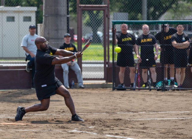 Officers and enlisted Soldiers compete in a softball game during Army Week festivities at Camp Zama, Japan, June 12, 2024. Personnel across U.S. Army Japan celebrated the Army’s 249th birthday with some friendly competition in various sports activities.