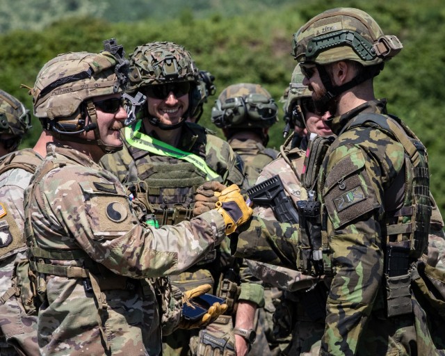 Virginia Army National Guard Soldiers assigned to the Charlottesville-based Alpha Company, 3rd Battalion, 116th Infantry Regiment, operating as Task Force St. Lo, conduct fire and movement drills with the Czech 72nd Mechanised Battalion at Daskabát Range May 9, 2024.