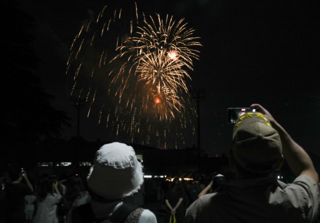 Spectators watch a fireworks display that capped off an Independence Day celebration at Camp Zama, Japan, June 29, 2024. More than 16,000 people attended the daylong event that had plenty of food and entertainment including military static...