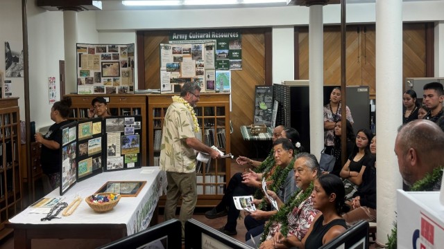 Members of the Kupuna Council for Agnes kalanihookaha Cope Traditional Native Hawaiian Healing Center looking over brochures of the Cultural Resources Program and preparing to listen to the presentation by the Civic Club of Wahiawa on the...