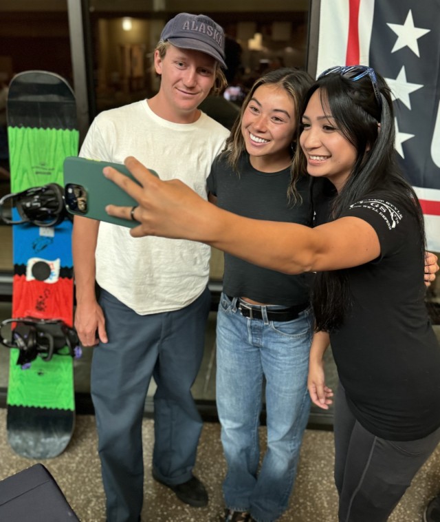 Olympians Red Gerard and Hailey Langland pose with Ermguard Vargas Escobar during a Meet and Greet with the Fort Greely Community July 25 at the Aurora Community Activity Center.