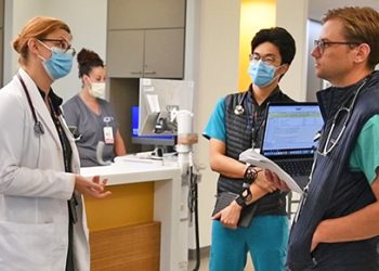 Designated education officers train health professions trainees