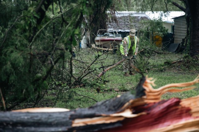 Florida Army National Guard Soldiers with the 1-265th Air Defense Artillery Battalion clear roads of debris during Hurricane Debby response operations in Lafayette County, Fla., on Aug. 5, 2024.