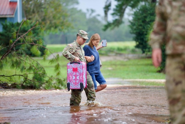 Soldiers from the 868th Engineer Company conduct a high-water rescue operation in Live Oak, Fla., following flooding from Hurricane Debby. The Florida National Guard is dedicated to response efforts to support the community and assist residents...