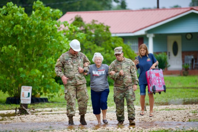 Soldiers from the 868th Engineer Company conduct a high-water rescue operation in Live Oak, Fla., following flooding from Hurricane Debby. The Florida National Guard is dedicated to response efforts to support the community and assist residents...