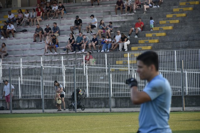 Italian and American families watch soccer game between American Soldiers and the local Cladogno team on July 23, 2024