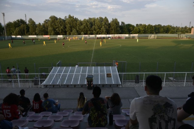Italian and American families watch soccer game between American Soldiers and the local Cladogno team on July 23, 2024