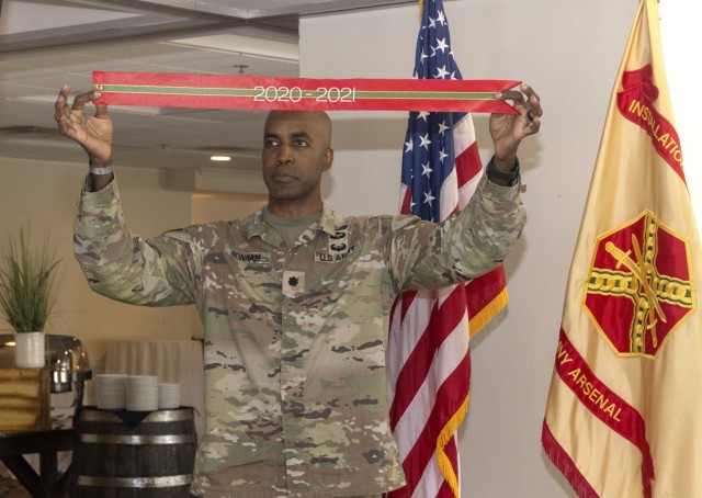 PICATINNY ARSENAL, N.J. - During an all-hands meeting and awards ceremony at Picatinny Arsenal, July 17, Lt. Col. Craig A. Bonham II, Picatinny Arsenal Garrison Commander, informed garrison employees that the unit would attach the award streamer...