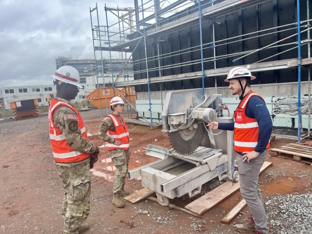 Reserve Officers’ Training Corps Cadets Deandre Wright of Morgan State University and Abbi Clark of Kansas State University discuss quality assurance work in the field with U.S. Army Corps of Engineer