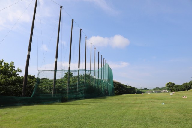 Contractors work on a net at the Camp Zama Golf Course's driving range in Japan Aug. 19, 2024. The course is currently undergoing extensive repairs to its mesh nets as part of an ongoing effort to keep balls inside the course area.
