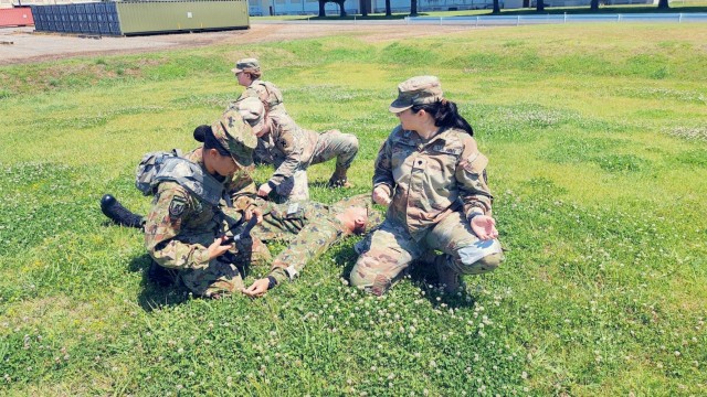 Japan Ground Self-Defense Force Sgt. Yumi Okazaki, left, assigned to the 4th Engineer Group, participates in Tactical Combat Casualty Care training June 5, 2024, at Sagami General Depot. Okazaki was part of the most recent cycle of JGSDF members...