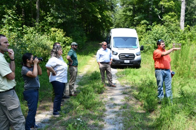 Fort Walker wildlife biologist Andrew Satterwhite describes some of the methods used for habitat preservation for the DCR while on a tour at Fort Walker on 1 August 2024