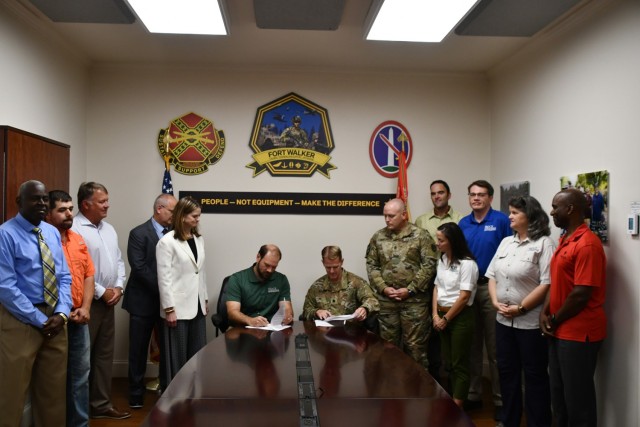 LTC Matthew Bauer and Mr. Matthew Wells sign the IGSA linking Fort Walker and the Virginia Department of Conservation and Recreation.