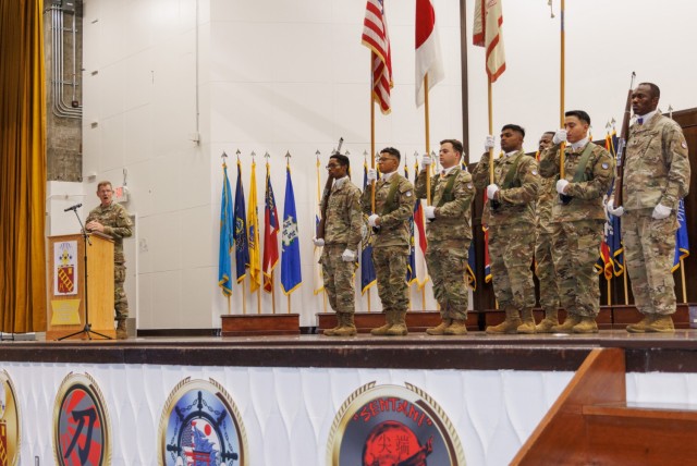 Col. Ned Holt, left, commander of the 10th Support Group, provides remarks during a reflagging ceremony inside Kizuna Hall at Camp Zama, Japan, July 31, 2024. The ceremony signified the 35th Combat Sustainment Support Battalion's transition to...