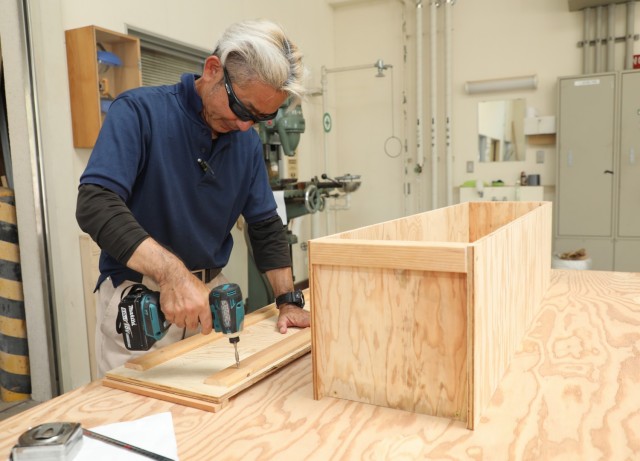 Tetsuya Suemasa, a carpenter for the Directorate of Public Works, puts the final touches on a storage box at the Akizuki Ammunition Depot in Japan, Sept. 5, 2024. The DPW workforce handles various skilled trade and office jobs to support tenant...