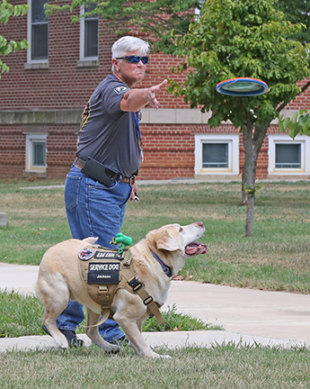 Jackson, a service dog, stays by Veteran’s side