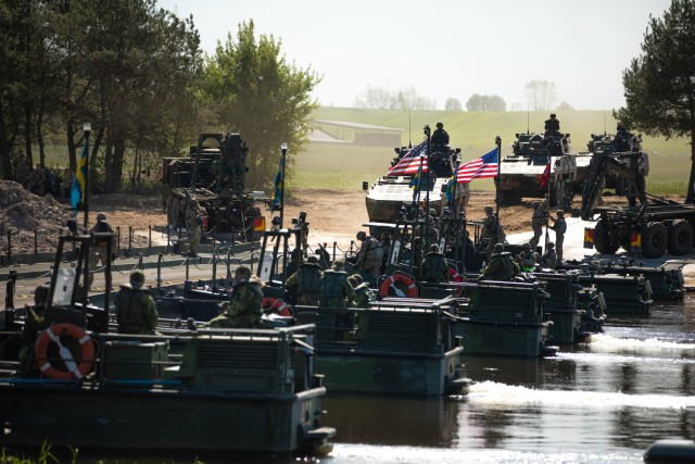 U.S. Army Soldiers and NATO allies complete a historic wet-gap crossing operation as part of Defender Europe 22 held at Nowogród, Poland, May 19, 2022. Defender Europe 2022 is a series of U.S. Army Europe and Africa multinational training...
