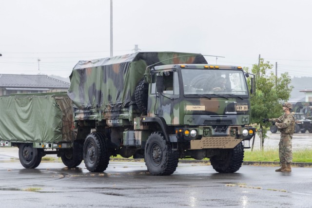 Army culinary specialists participate in a convoy movement drill as part of a two-day exercise to hone their Soldier skills at Sagami General Depot, Japan, Oct. 8, 2024. Teams of Soldiers assigned to the 765th Transportation Terminal Battalion’s...