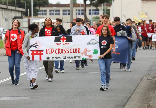Zama Middle High School students participate in a homecoming parade at Camp Zama, Japan, Oct. 10, 2024. Several U.S. Army Garrison Japan personnel helped with the parade and a bonfire that night in support of the school.