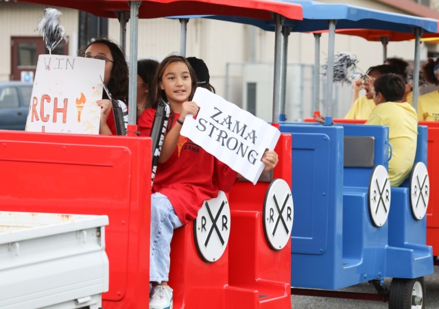 Zama Middle High School students participate in a homecoming parade at Camp Zama, Japan, Oct. 10, 2024. Several U.S. Army Garrison Japan personnel helped with the parade and a bonfire that night in support of the school.